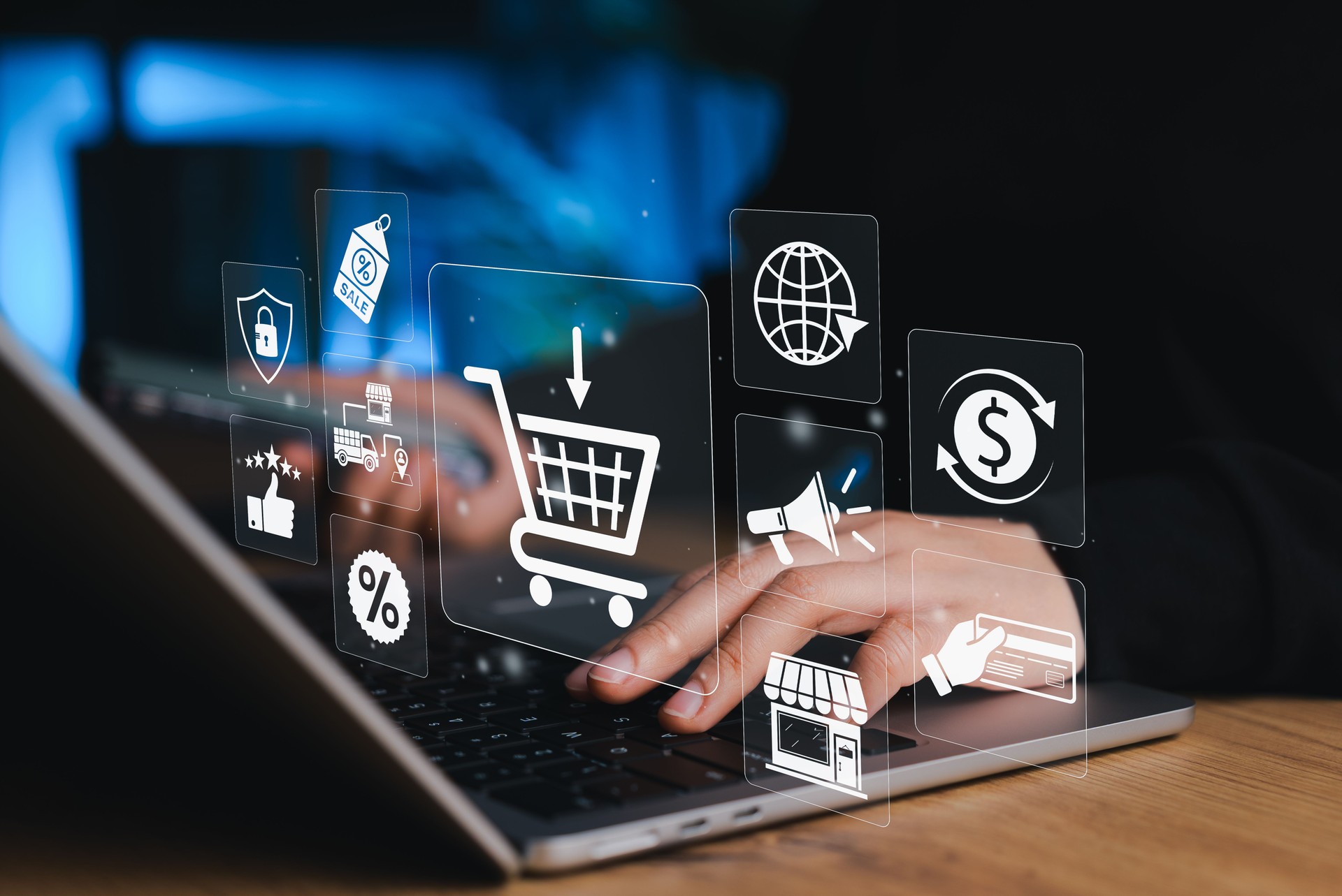 Online shopping and e-commerce technology internet concept. hands typing on a laptop surrounded by virtual icons representing e-commerce, online shopping, and digital marketing. Internet retail,